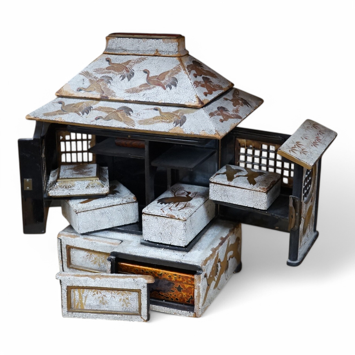 An early 20th century Japanese lacquer cabinet in the form of a temple, 23cm. Condition - fair